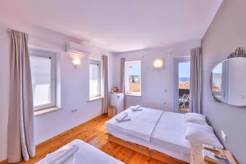 Double/Triple Sea View Room